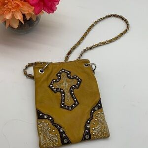 Rustic Couture’s Gold Leather Crossbody Bag. SM1717
